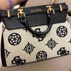 GUESS Black & Cream Logo-Pattern Top-Handle Satchel it’s a mini